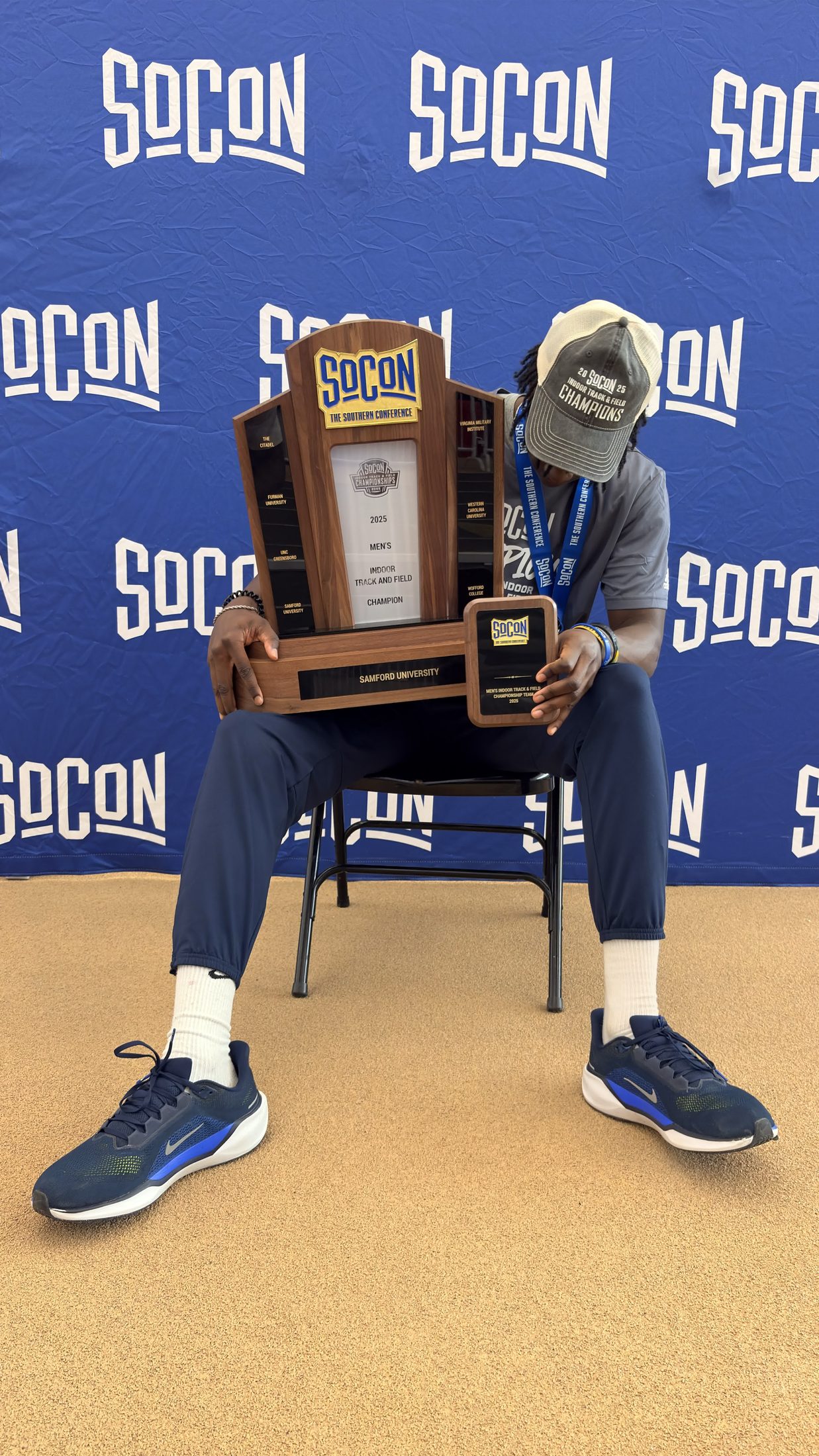 Brenden Vanderpool with the SoCon championship trophy