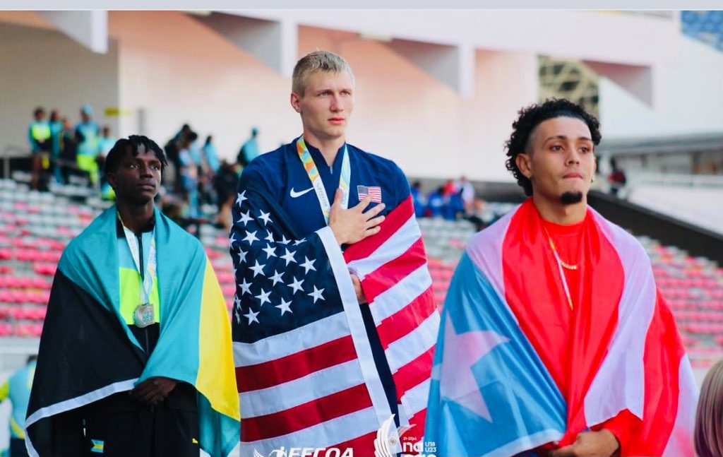 Medal ceremony, Brenden Vanderpool with the Bahamas flag
