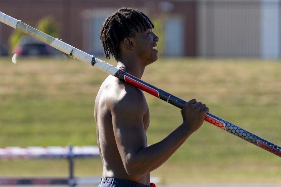 Brenden Vanderpool with the pole on his shoulder