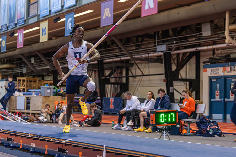 Brenden Vanderpool over the bar at the Illinois Armory